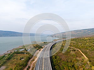 The M6 motorway Expressway Nakhon Ratchasima Province - Bang Pa-in. Lam Ta Khong River and Mountain. Drone shot of scenic