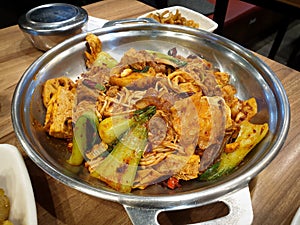 Ma la xiang pan, or Ma la xiang guo, a Chinese food dish containing meat and vegetables. Spicy numbing stir-fry pot. photo