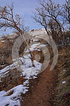 Maack Hill Sensei hiking trail views in snowy mountains, Lone Peak Wilderness Wasatch Rocky Mountains, Utah.