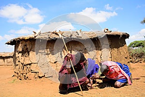 Maasai men lighting fire, Kenya