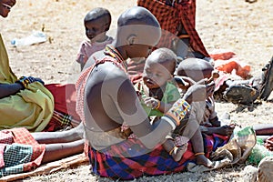 Maasai mother playing with baby, Tanzania