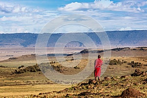 Maasai Tribe Man Looking Over Land photo
