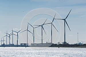 Maasvlakte Rotterdam and its wind turbines farm generating energy. Massive man-made westward extension of the Europoort