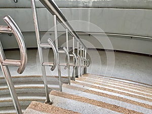Mable steps with stainless balustrades.