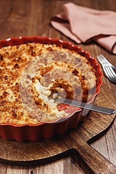 Mac and cheese. American Cheese pasta casserole with cheese sauce and crispy breadcrumbs