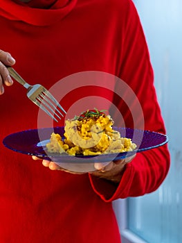 Mac and cheese, baked macaroni pasta in cheesy creamy milk butter sauce american style. Hot casserole in male hands