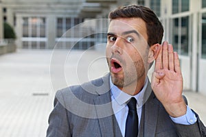 Macabre businessman digging a gossip