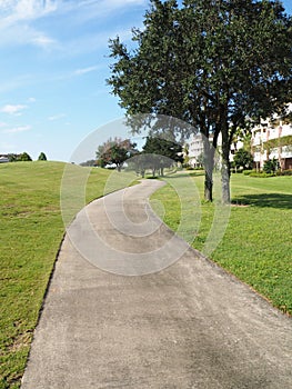 Macadam path by a golf course