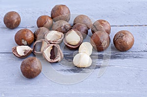 Macadamia is an Australian nut, a Kindal. On a wooden fob is a gray-blue color