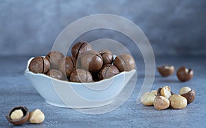 Macadamia nut in a vase. selective focus. kindal, australian walnut. fruit has a creamy chocolate taste.