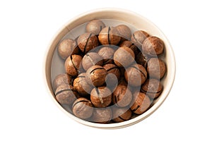 Macadamia nuts in a shell isolated on a white background