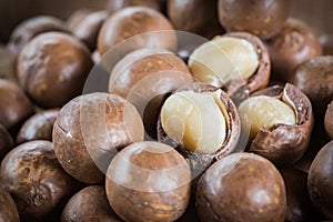 Macadamia nuts with shells photo
