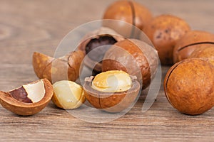 Macadamia nuts on wooden table