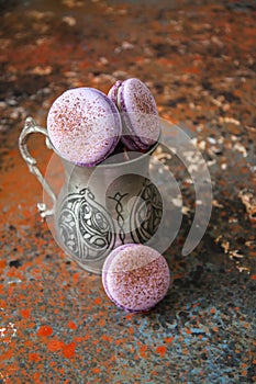 Macaron cookies in a vintage jar