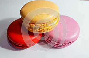 Macaron is a French confection of egg whites, powdered sugar, granulated sugar, ground almonds and food coloring.