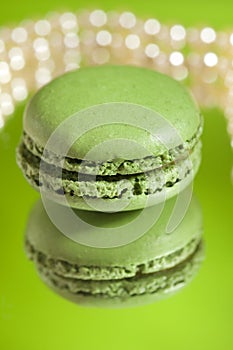 Macaron Matcha Green with its own reflection