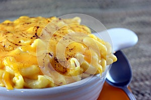 Decadent and creamy macaroni and cheese, perfect for satisfying your cravings. photo