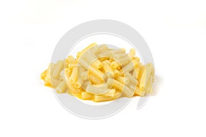 Macaroni and cheese dinner pasta. Orange cheesy pasta isolated over white