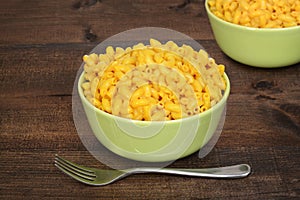 Macaroni and cheese with fork