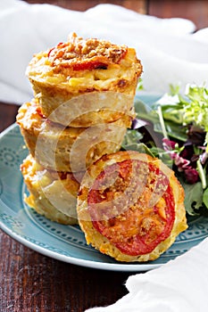 Macaroni and cheese in muffin tins photo