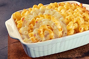 Macaroni and cheese pasta in a casserole, cheesy American dish, baked