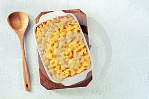 Macaroni and cheese pasta in a casserole, overhead flat lay shot