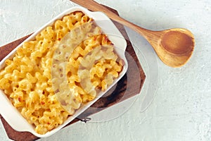 Macaroni and cheese pasta in a casserole, overhead flat lay shot