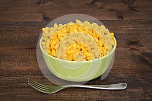 Macaroni and cheese on wood table