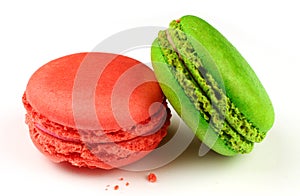 Macaroni colored pastry cookies on a white background