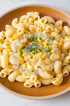 Macaroni creamy corn cheese on plate