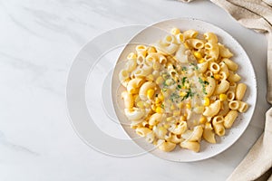 Macaroni creamy corn cheese on plate