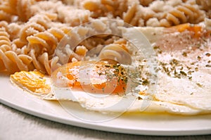 Macaroni from durum wheat with parmesan and fried