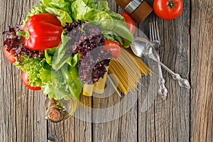 Macaroni ingredients on wood