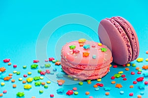 Macarons cakes or macaroon on turquoise background