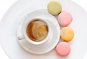 Macarons with a coffee cup isolated on white background, Good morning or have a nice day message concept, white cup of espresso