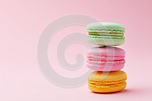 Macarons. Colorful Macaroons On Pink Background photo