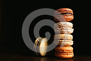 Macarons on dark background