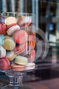 Macarons in a glass jar, candy store window display