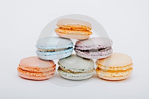 Macaroons, baked sweets from the pastry shop on white background