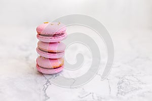Macaroons close up. Pink macaroons on the murble table