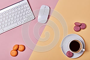 Macaroons, coffee  and computer keyboard photo