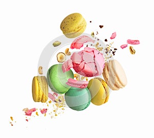 Macaroons fly around with nuts on a white background