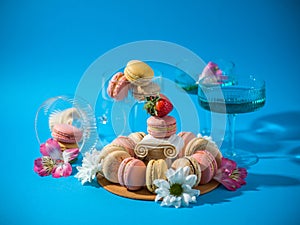 Macaroons over a blue background