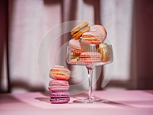 Macaroons over a pink background