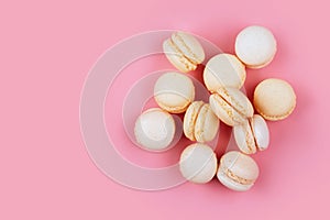 Macaroons in a pink background.
