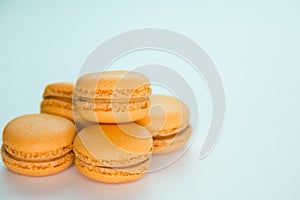 Macaroons on white background top, colorful yellow macaroons, selective focus