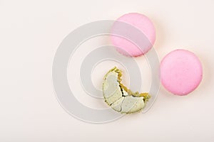 Macaroons on yellow background.