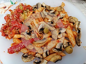 Macarrones tipical good food Spanish with tomatoes and tuna photo