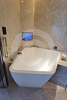 Macau Cotai Stylish Morpheus Hotel Amenities Bathroom TV Bath Tub Shower Restroom Zaha Hadid Interior Design Luxury Lifestyle