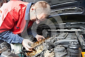 Machanic repairman at automobile car engine repair